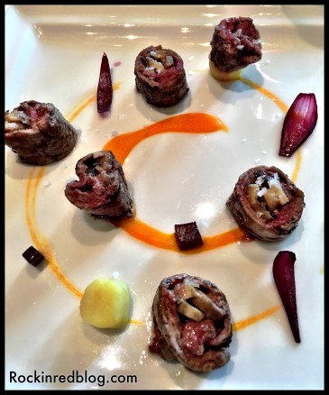 beef medallions wrapped around mushrooms and shallots 