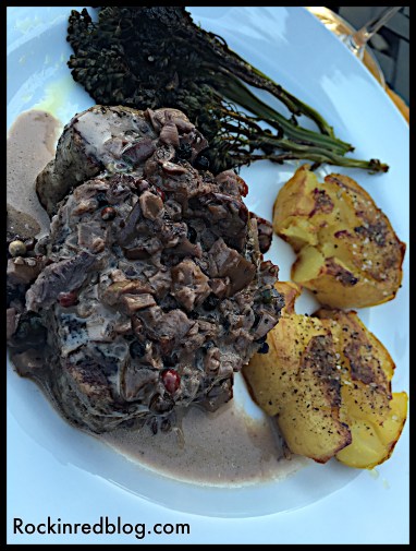 steak with mushroom sauce potatoes and brocolini
